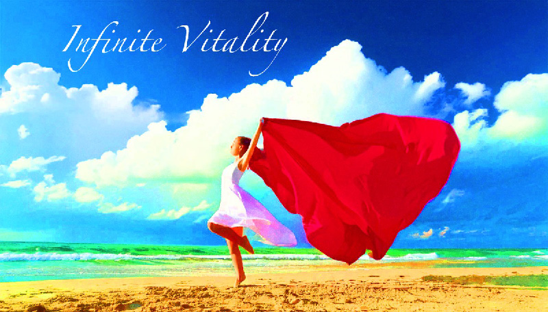 Infinite Vitality - Woman with flowing fabric on beach